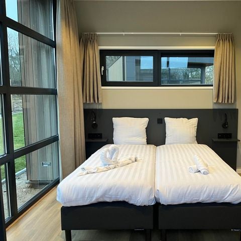 VAKANTIEHUIS 10 personen - L-cube geschakeld sauna 10 VAKANTIEHUIS 10 personen - L-cube geschakeld sauna 10