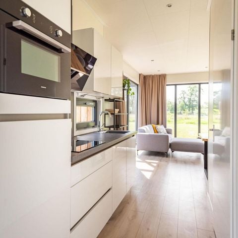 Lodge 6 personen - Waterlodge 6 Deluxe met sauna en hottub