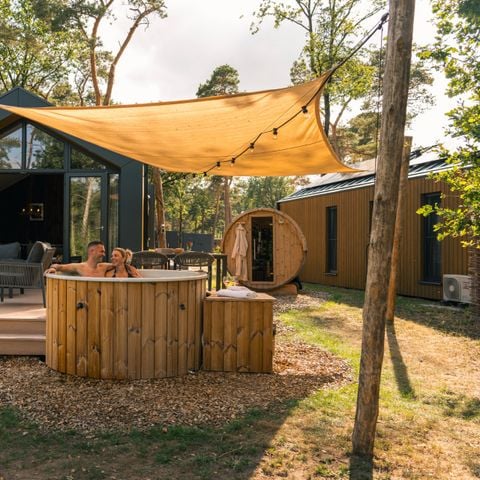 Lodge 6 personen - Boslodge met hottub & sauna