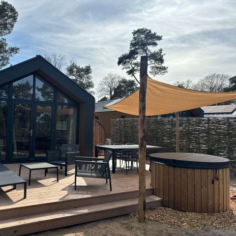 Lodge 6 personen - Boslodge met hottub & sauna