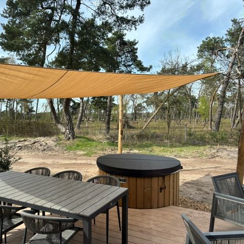 Lodge 6 personen - Boslodge met hottub & sauna