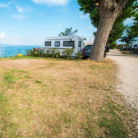 STAANPLAATS - Standplaats met uitzicht op het meer 60 m²