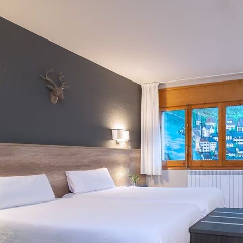 Slaapkamer 3 personen - Hotelkamer Mountainview